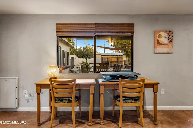 dining area with baseboards