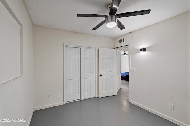 unfurnished bedroom with a closet and ceiling fan