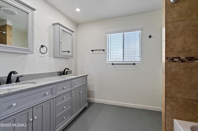 bathroom with vanity, separate shower and tub, and concrete floors