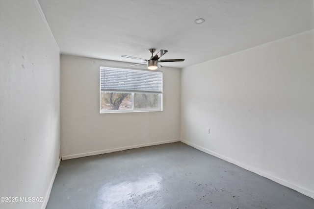 unfurnished room featuring concrete flooring and ceiling fan