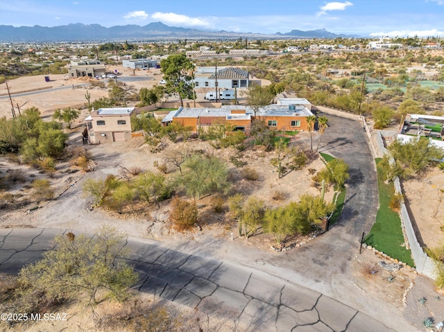 drone / aerial view featuring a mountain view