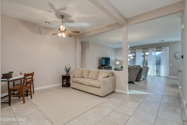 tiled living room featuring beamed ceiling and ceiling fan