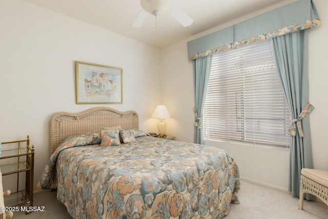 bedroom featuring ceiling fan and carpet flooring