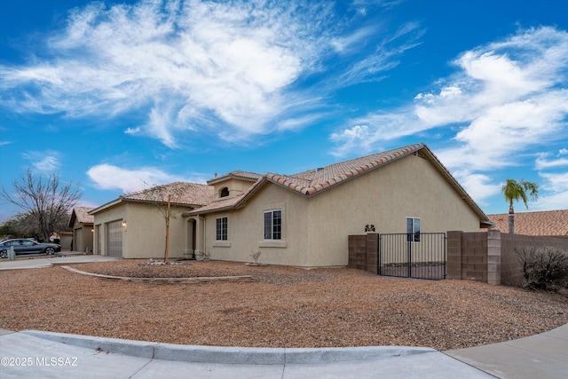 view of side of property with a garage