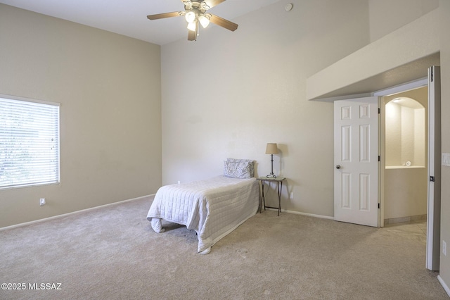 unfurnished bedroom with light colored carpet and ceiling fan