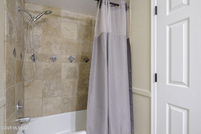 bathroom featuring shower / bath combination with curtain