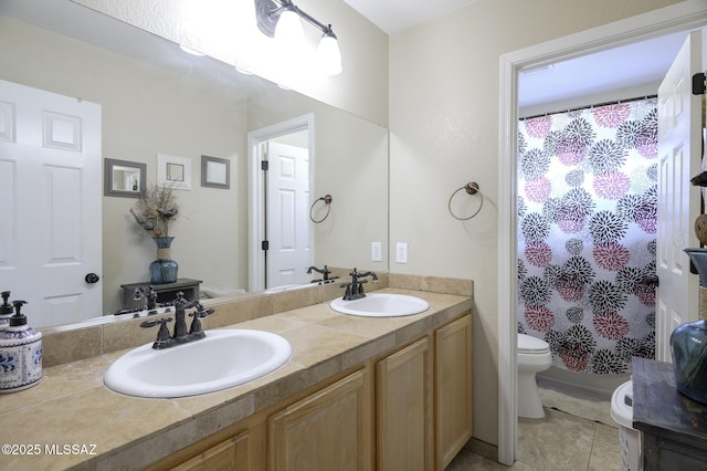 bathroom featuring tile patterned floors, vanity, toilet, and a shower with shower curtain