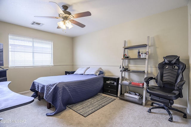 carpeted bedroom featuring ceiling fan