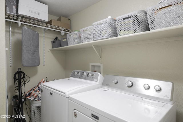 laundry area featuring independent washer and dryer