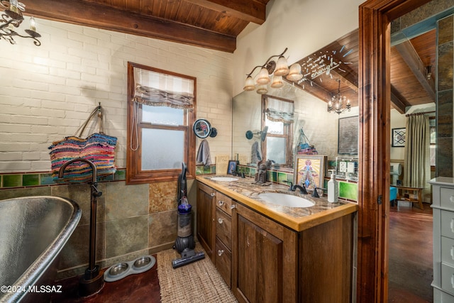 bathroom with wood ceiling, a bathtub, vanity, brick wall, and beamed ceiling