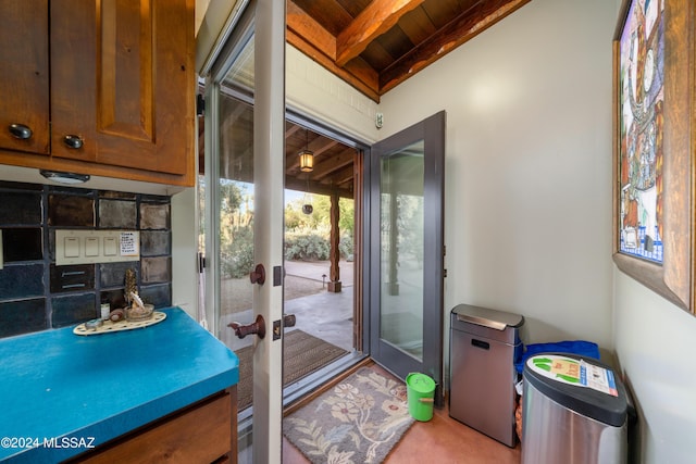 entryway with beam ceiling and wooden ceiling