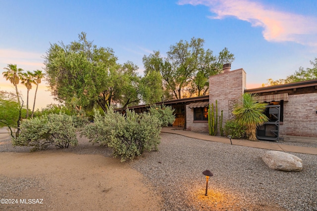 view of front of home featuring a patio area