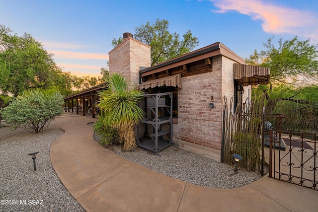 view of property exterior at dusk