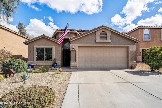 view of front of home featuring a garage