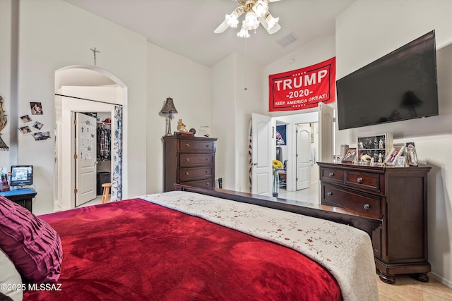 bedroom with ceiling fan and vaulted ceiling