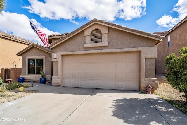 view of front of property with a garage