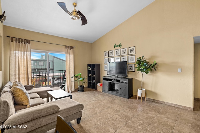 living room featuring vaulted ceiling and ceiling fan