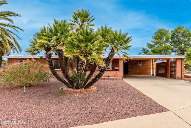 view of front of property with a carport