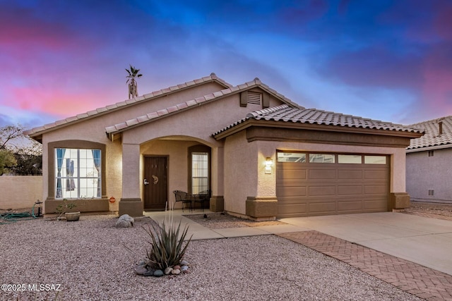 view of front of house with a garage