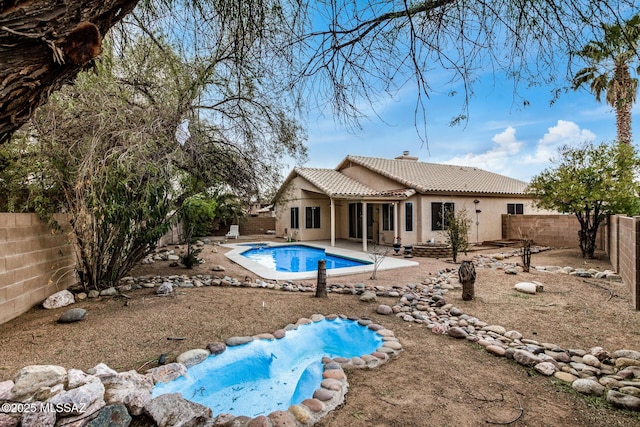 view of pool featuring a patio