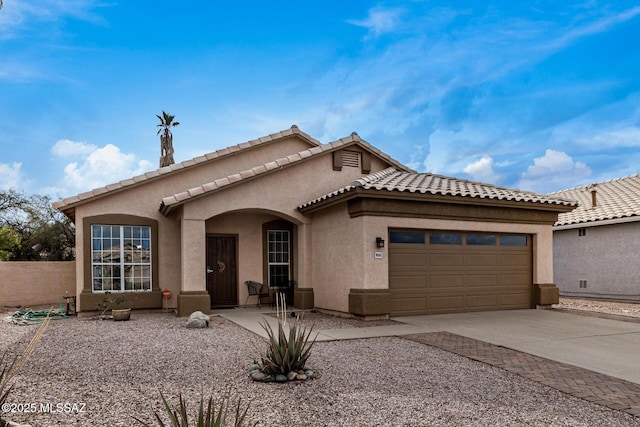 view of front of home with a garage