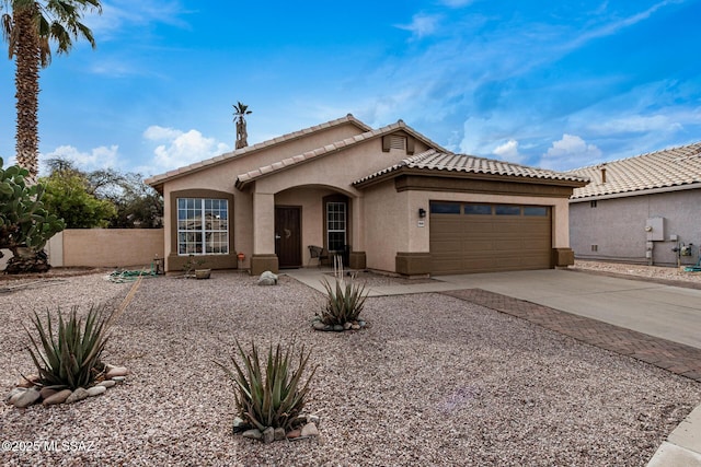 view of front of home with a garage