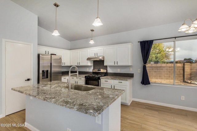 kitchen featuring white cabinetry, stainless steel appliances, sink, and light hardwood / wood-style flooring