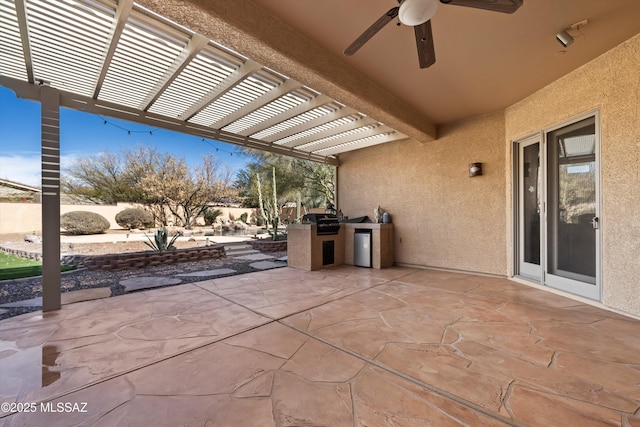 view of patio / terrace with area for grilling, a pergola, and exterior kitchen