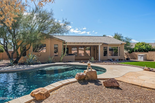 view of pool with a patio area