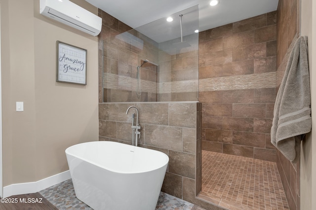 bathroom featuring a wall mounted air conditioner and independent shower and bath