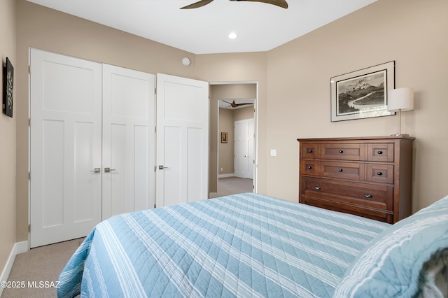 carpeted bedroom with ceiling fan