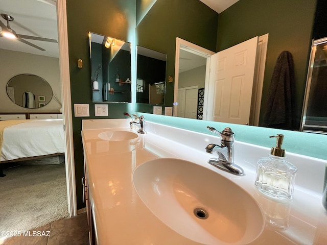 bathroom with ceiling fan and vanity