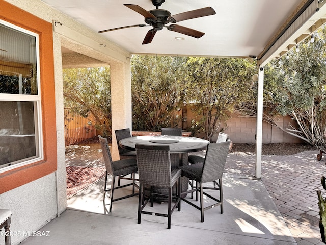 view of patio featuring ceiling fan