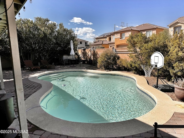 view of swimming pool featuring a patio