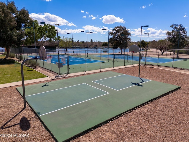 exterior space featuring tennis court