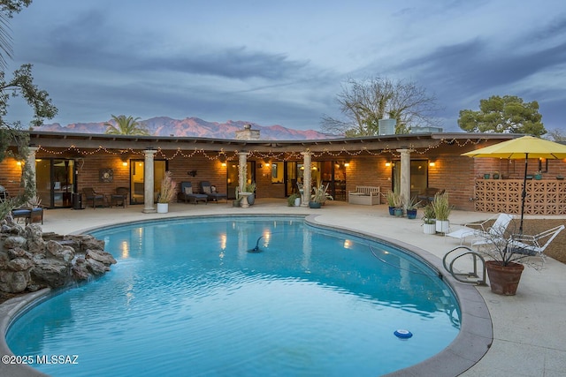 outdoor pool with a patio