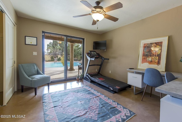 exercise room featuring a ceiling fan