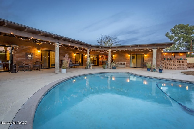 pool featuring a patio