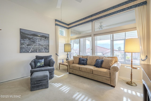 living room featuring ceiling fan