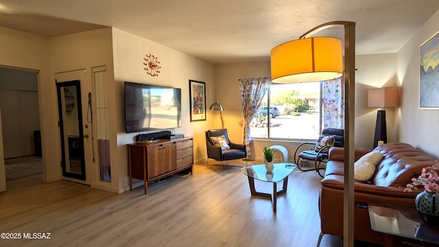 449 W San Ignacio, Green Valley, AZ 85614 - living room featuring light wood-type flooring