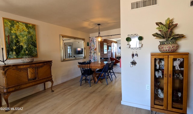 449 W San Ignacio, Green Valley, AZ 85614 - dining room featuring wood finished floors and baseboards