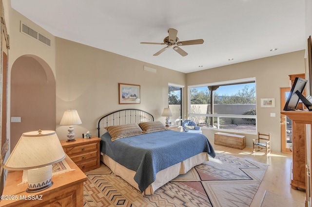 bedroom featuring ceiling fan and light wood-type flooring