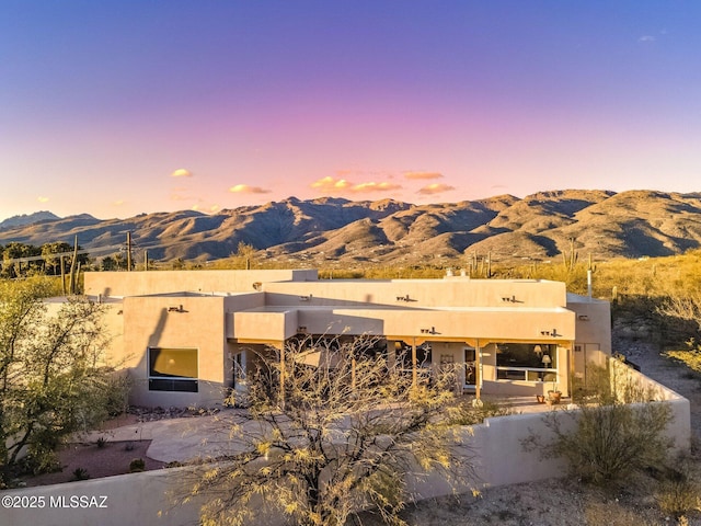 exterior space featuring a mountain view