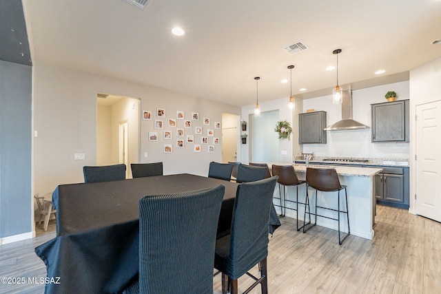 dining area featuring light hardwood / wood-style flooring