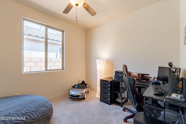 office space with ceiling fan and carpet flooring