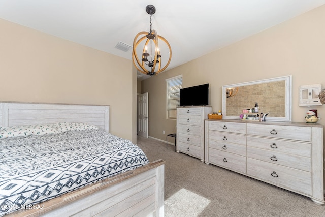 carpeted bedroom with a notable chandelier