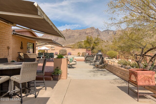 view of patio featuring a bar