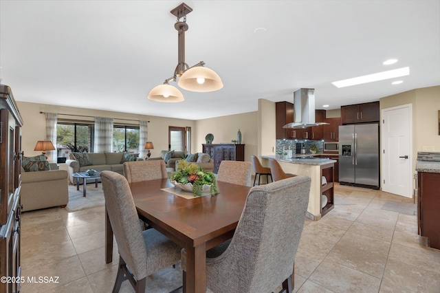 view of tiled dining space