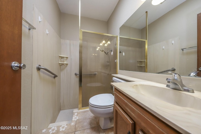 bathroom featuring walk in shower, vanity, tile patterned floors, and toilet