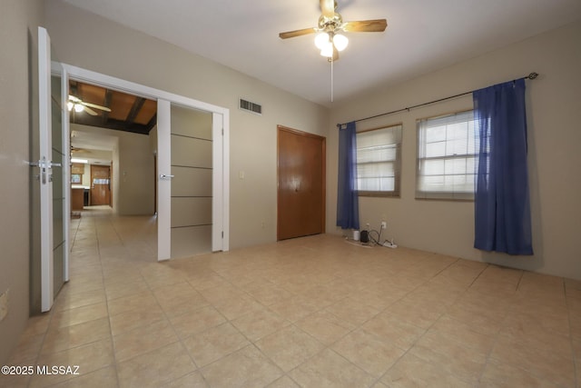 unfurnished bedroom with ceiling fan